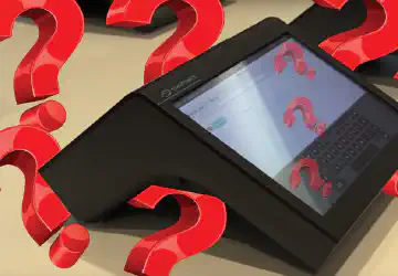 Una voting machine con punti interrogativi tutt'intorno